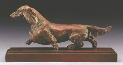 bronze canine sculpture by Joy Beckner
