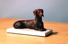 Joy Beckner canine sculpture in bronze