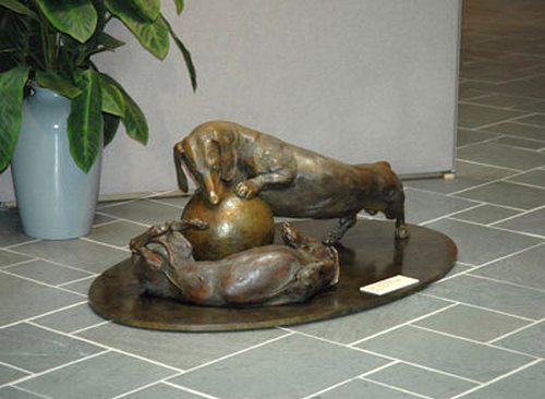 Life is Sweet SS life-size bronze Dachshund sculpture at Dunnegan Gallery by Joy Beckner
