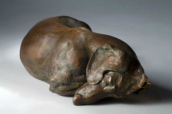 Siesta a bronze Dachshund sculpture by Joy Beckner