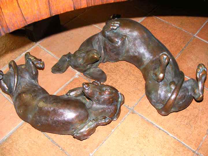 Sweet Roll life-size bronze Dachshund sculpture by Joy Beckner in real life