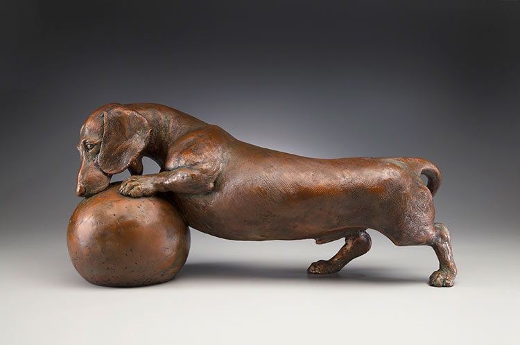 bronze dachshund sculpture by Joy Beckner
