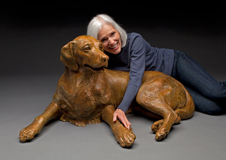 life-size bronze Golden Retreiver sculpture with by Joy Beckner