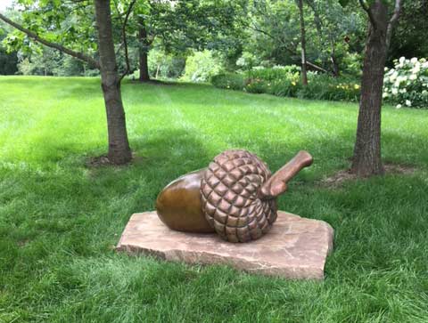 A Squirrel’s Dream A Bronze Acorn Sculpture by Joy Beckner fine sculptor