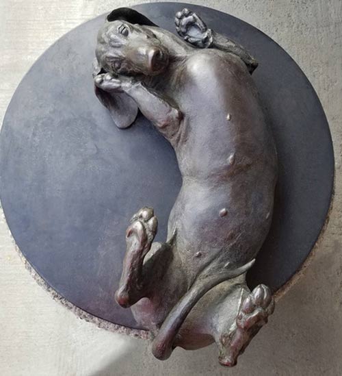 Sweet Roll life-size bronze Dachshund sculpture by Joy Beckner